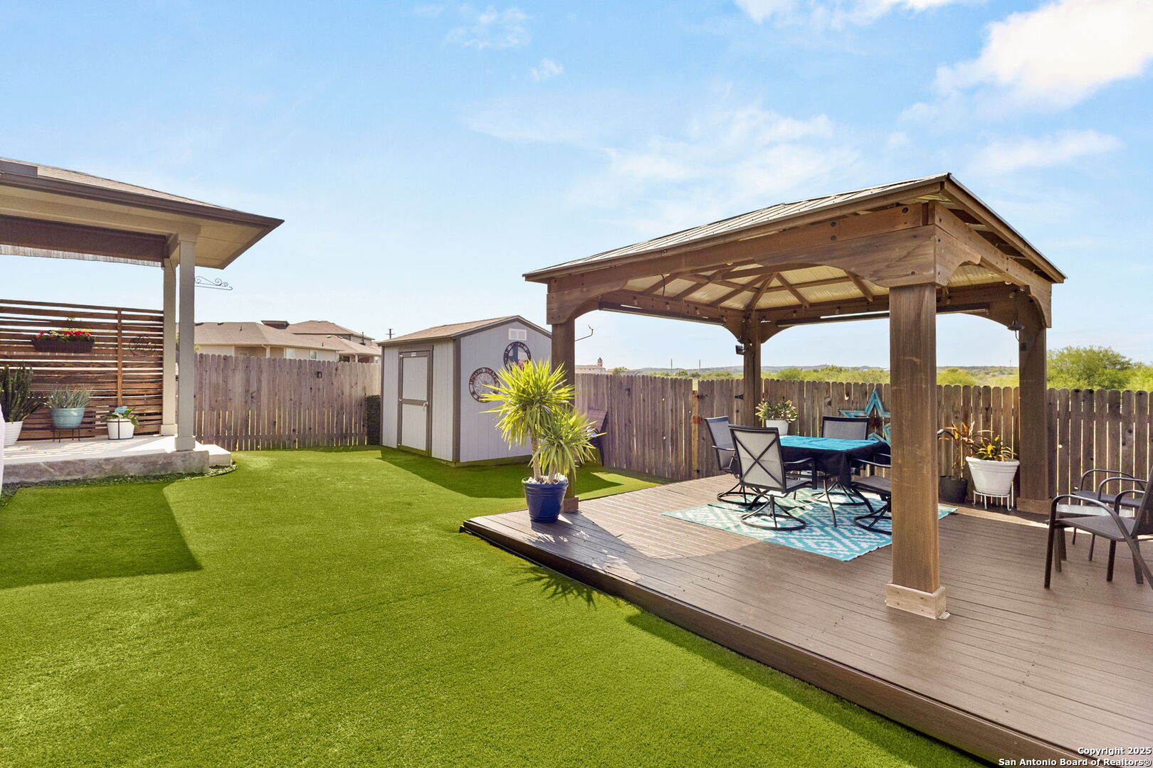 120 New Hampton Way San Marcos, TX 78666 - Photo 1 of 1 a view of a backyard with a patio