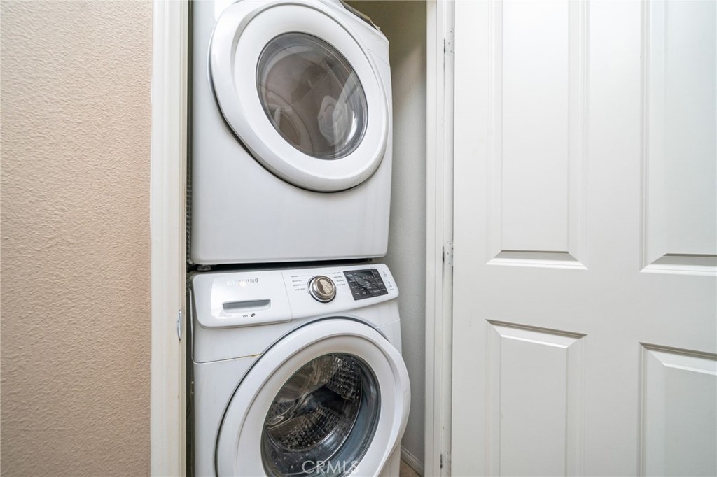 16001 Chase Road, Unit 72 Fontana, CA 92336 - Photo 15 of 43 a close view of a utility room with dryer and washer