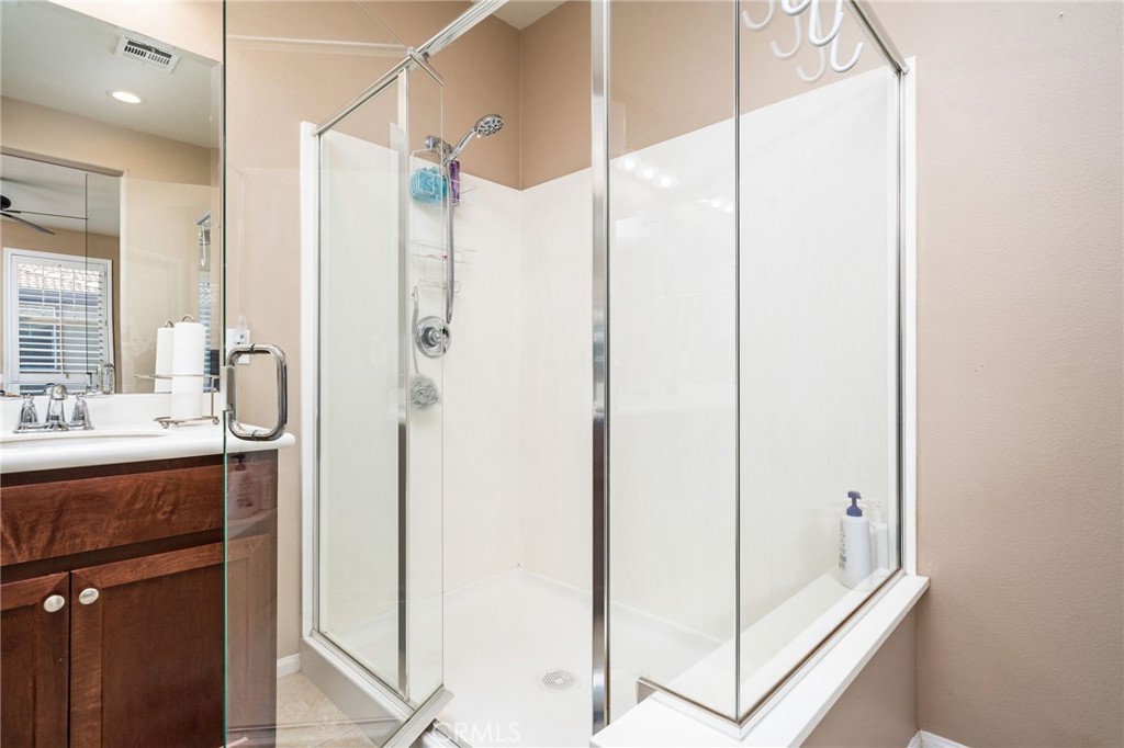 16001 Chase Road, Unit 72 Fontana, CA 92336 - Photo 21 of 43 a bathroom with a shower and a sink
