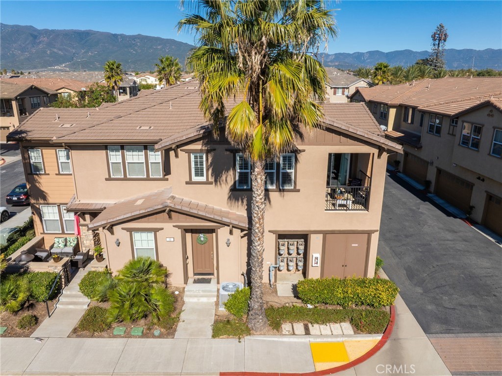 16001 Chase Road, Unit 72 Fontana, CA 92336 - Photo 30 of 43 a front view of residential houses with outdoor space and lakeside