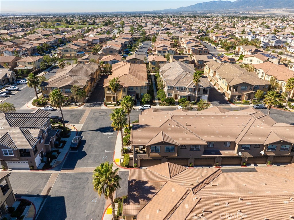 16001 Chase Road, Unit 72 Fontana, CA 92336 - Photo 33 of 43 an aerial view of a houses with yard
