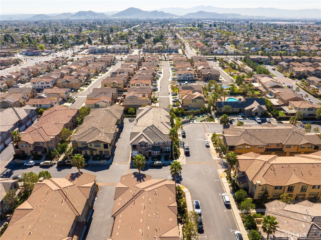 16001 Chase Road, Unit 72 Fontana, CA 92336 - Photo 35 of 43 an aerial view of residential houses with outdoor space
