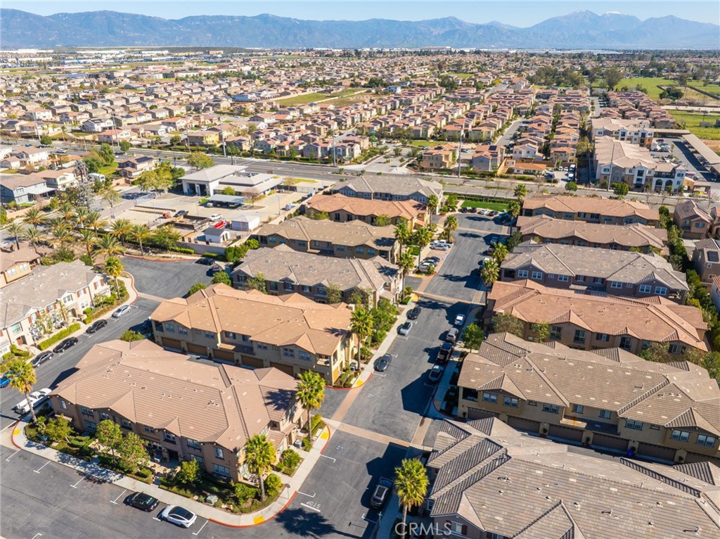 16001 Chase Road, Unit 72 Fontana, CA 92336 - Photo 37 of 43 an aerial view of residential houses with outdoor space