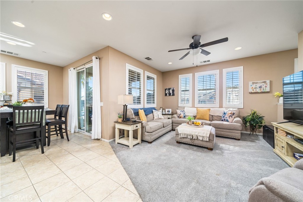 16001 Chase Road, Unit 72 Fontana, CA 92336 - Photo 6 of 43 a living room with furniture and windows