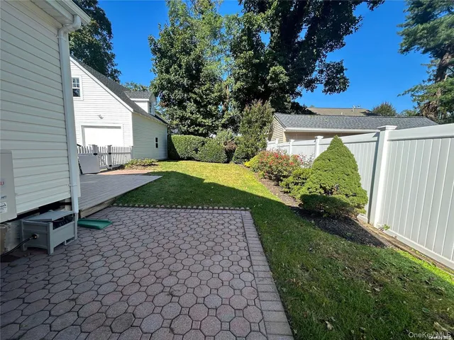 a view of a backyard with a garden
