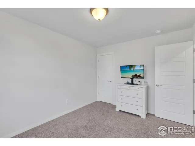 a bathroom with a sink a mirror and a toilet