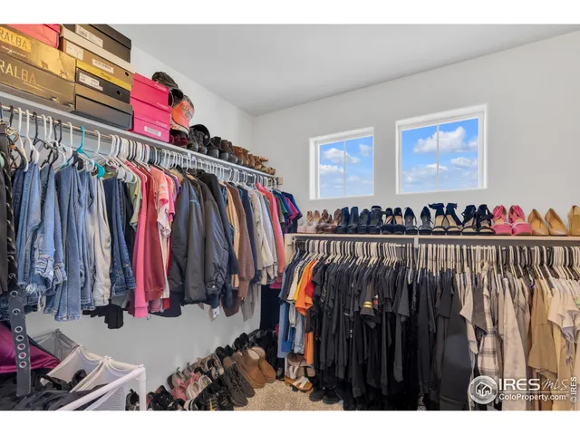 a bathroom with a sink vanity mirror and toilet