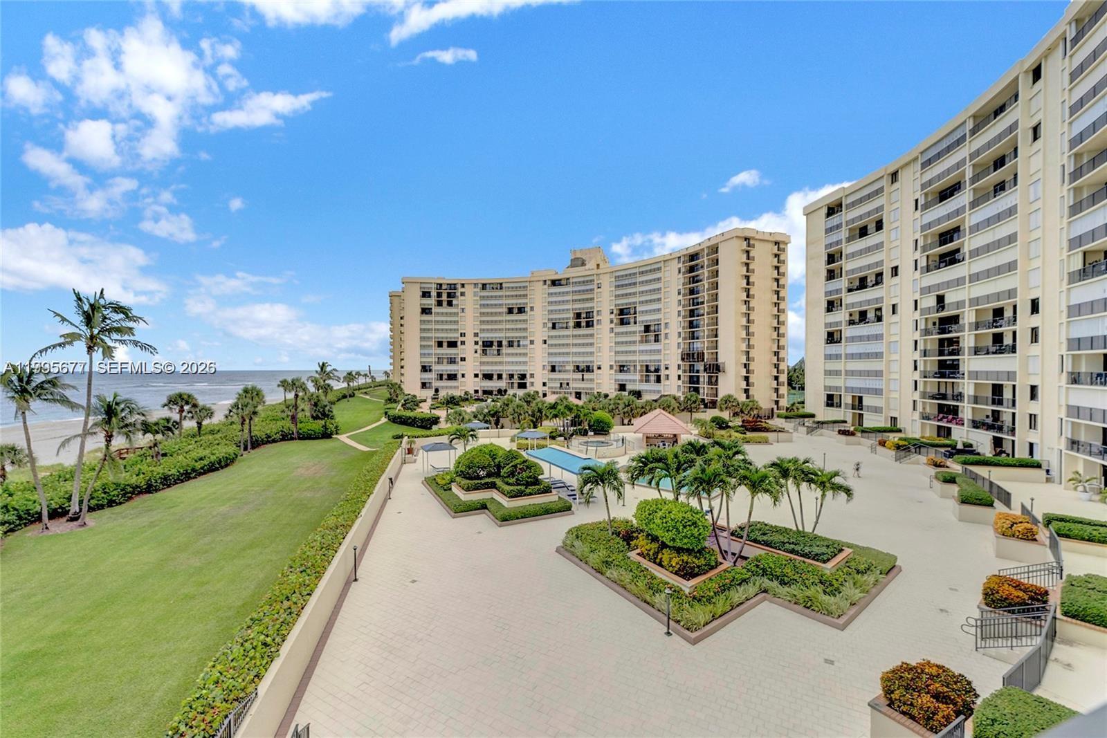 400 Ocean Trail Way, Unit 401 Jupiter, FL 33477 - Photo 3 of 28 a view of a city and tall buildings