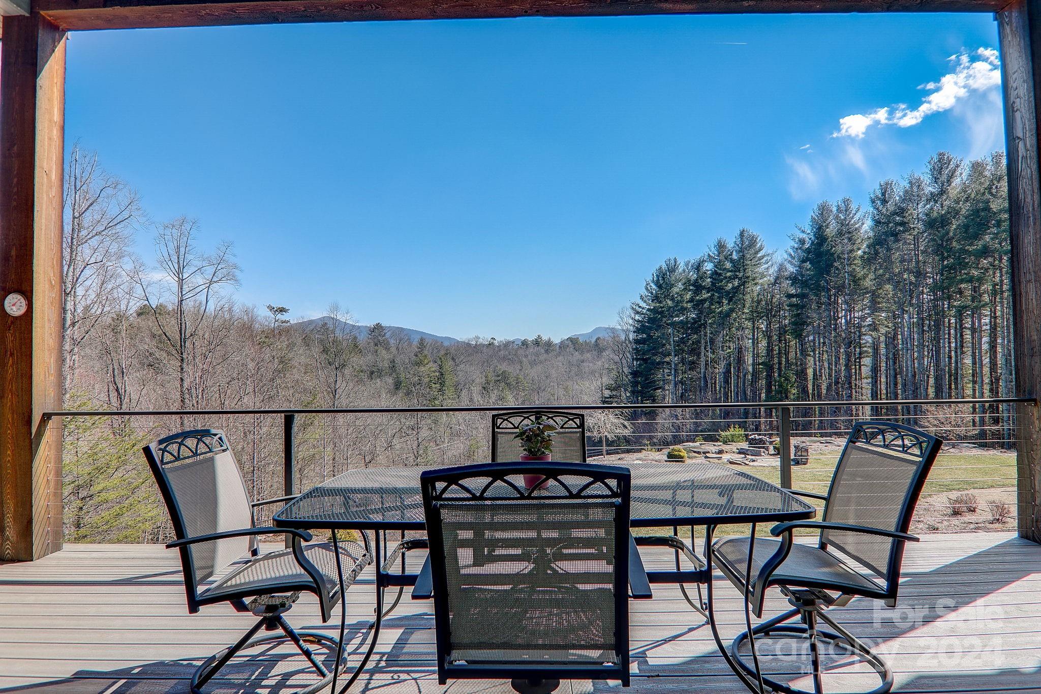 34 Ledgestone Drive Fairview, NC 28730 - Photo 14 of 47 a view of a chairs and table in patio