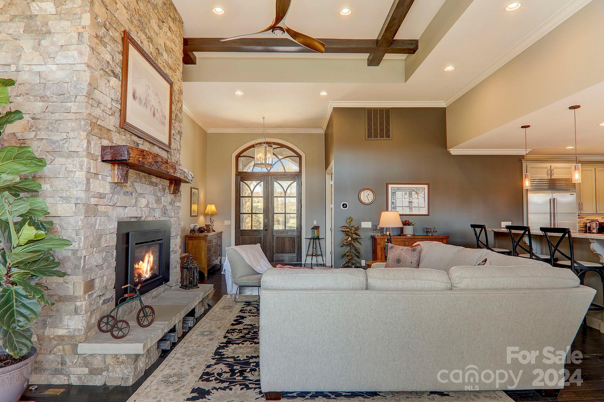 34 Ledgestone Drive Fairview, NC 28730 - Photo 17 of 47 a living room with furniture and a fireplace