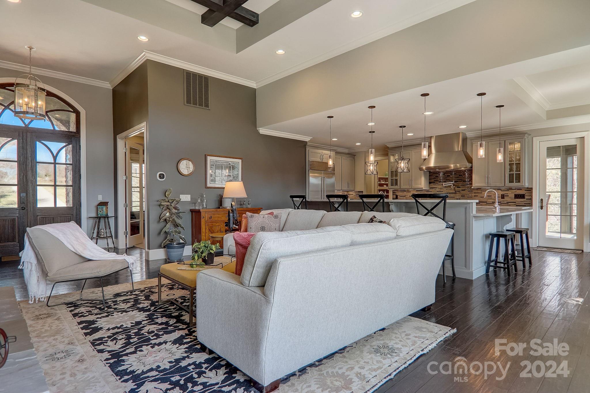 34 Ledgestone Drive Fairview, NC 28730 - Photo 18 of 47 a living room with furniture and kitchen view