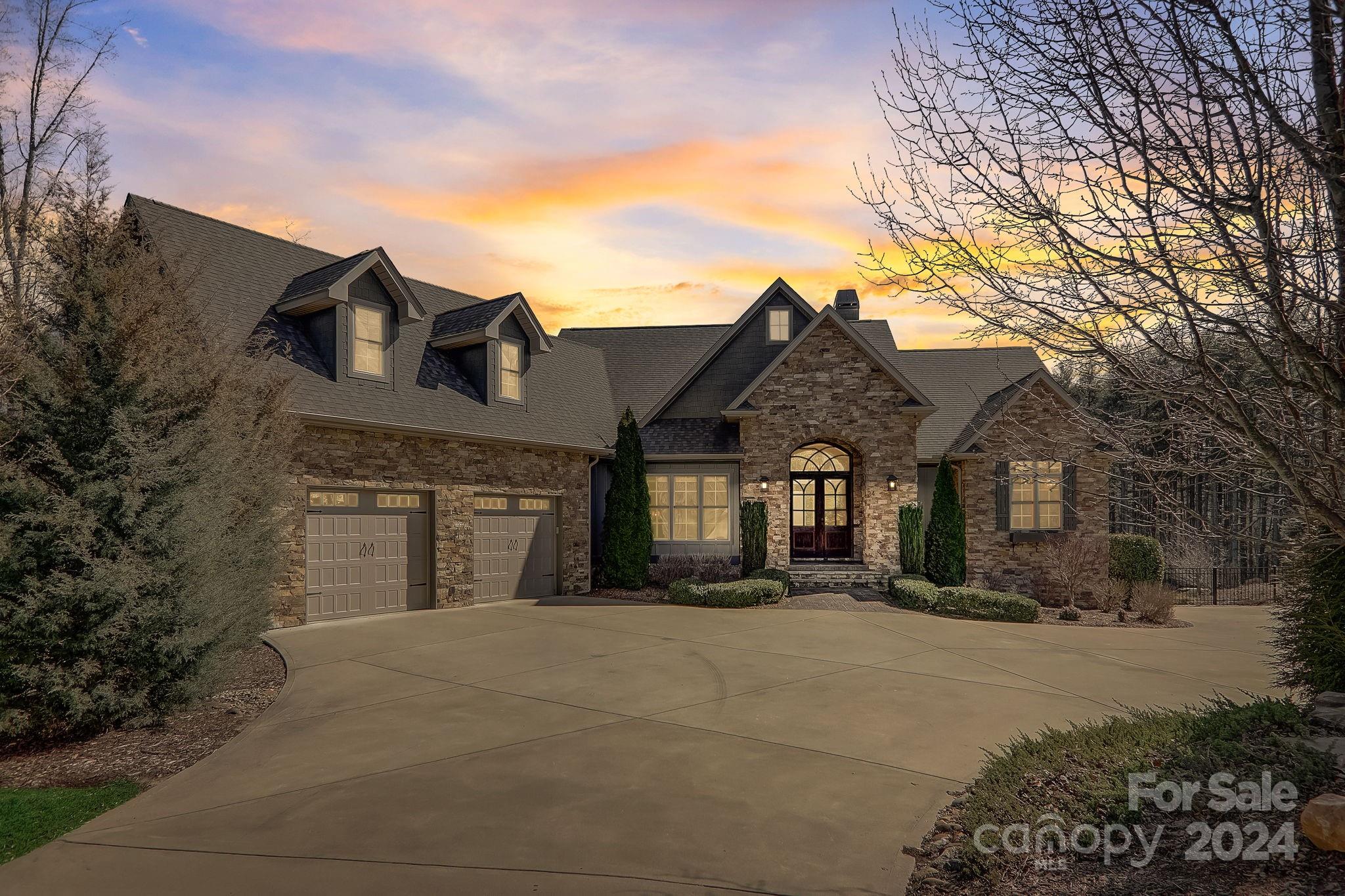 34 Ledgestone Drive Fairview, NC 28730 - Photo 2 of 47 a front view of a house with a yard