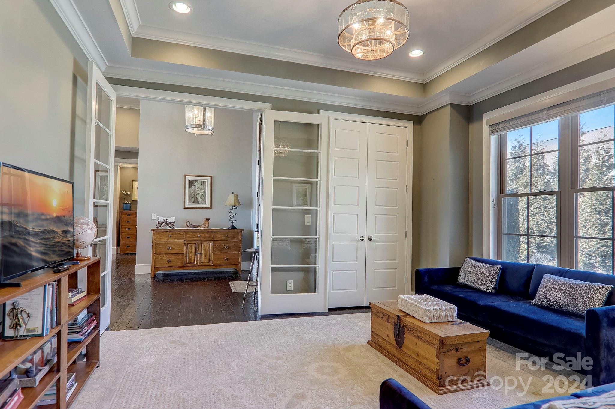 34 Ledgestone Drive Fairview, NC 28730 - Photo 22 of 47 a living room with furniture and a flat screen tv