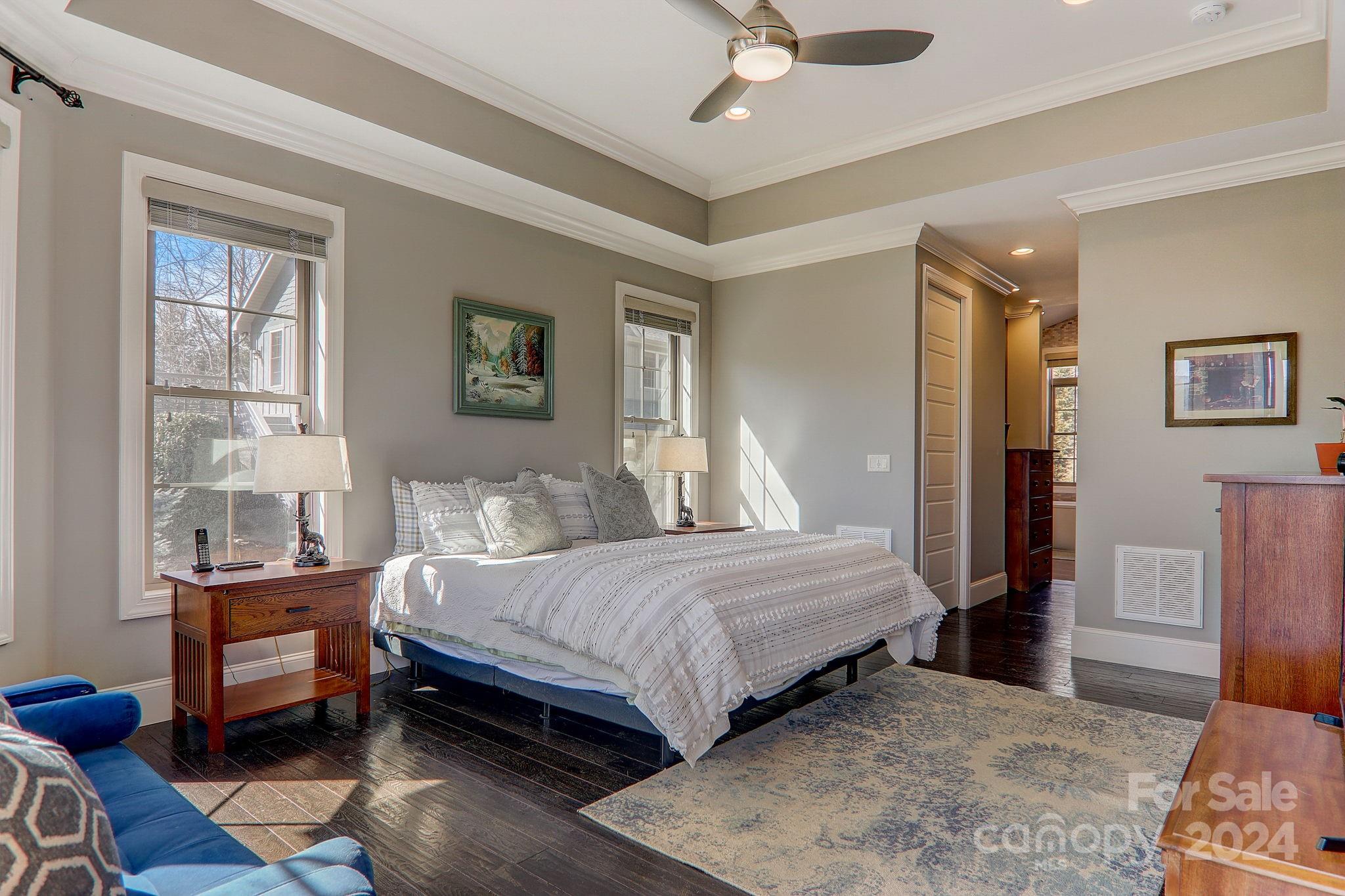 34 Ledgestone Drive Fairview, NC 28730 - Photo 25 of 47 a bedroom with a bed wooden floor and window