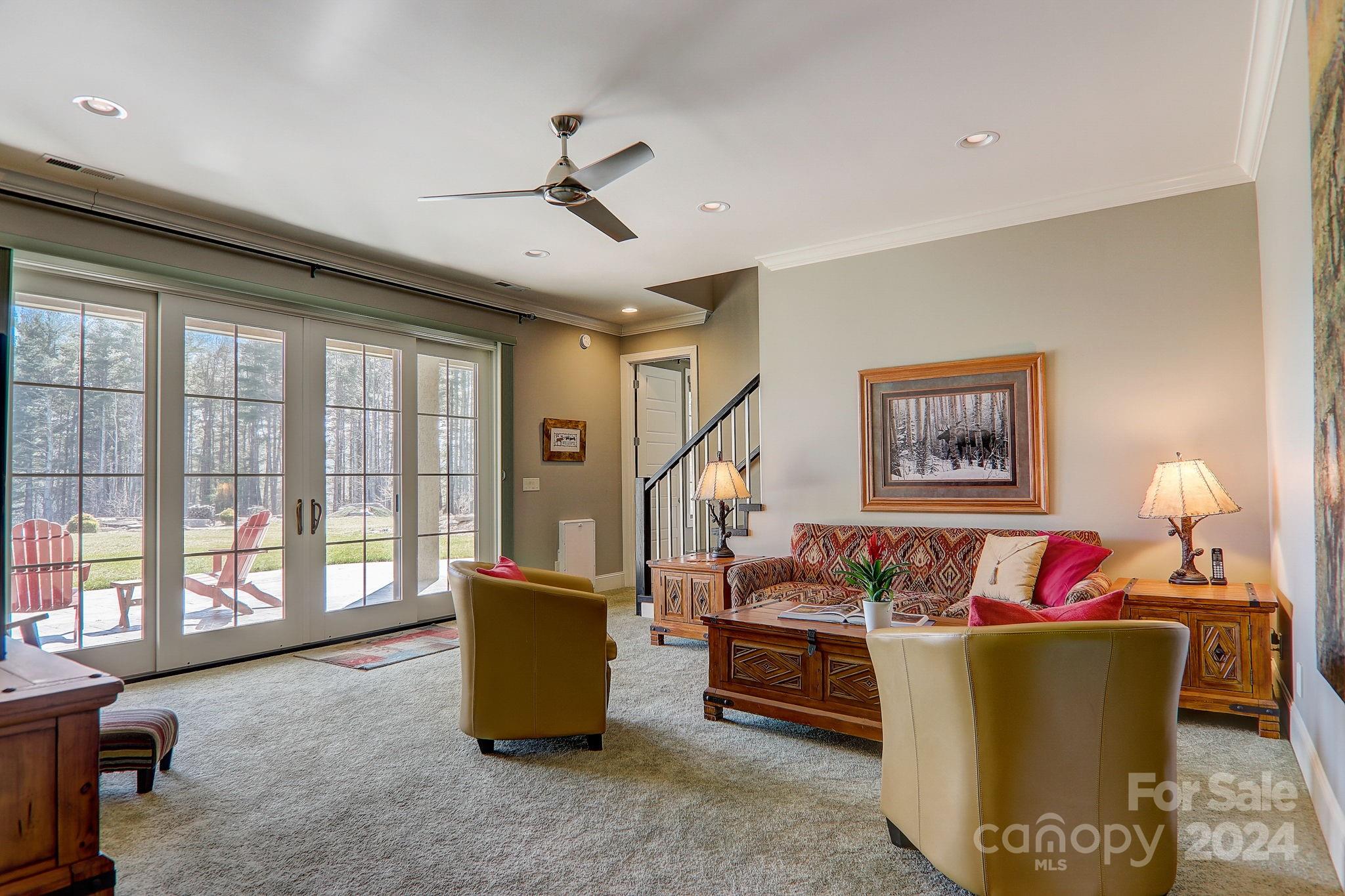 34 Ledgestone Drive Fairview, NC 28730 - Photo 31 of 47 a living room with furniture and a window