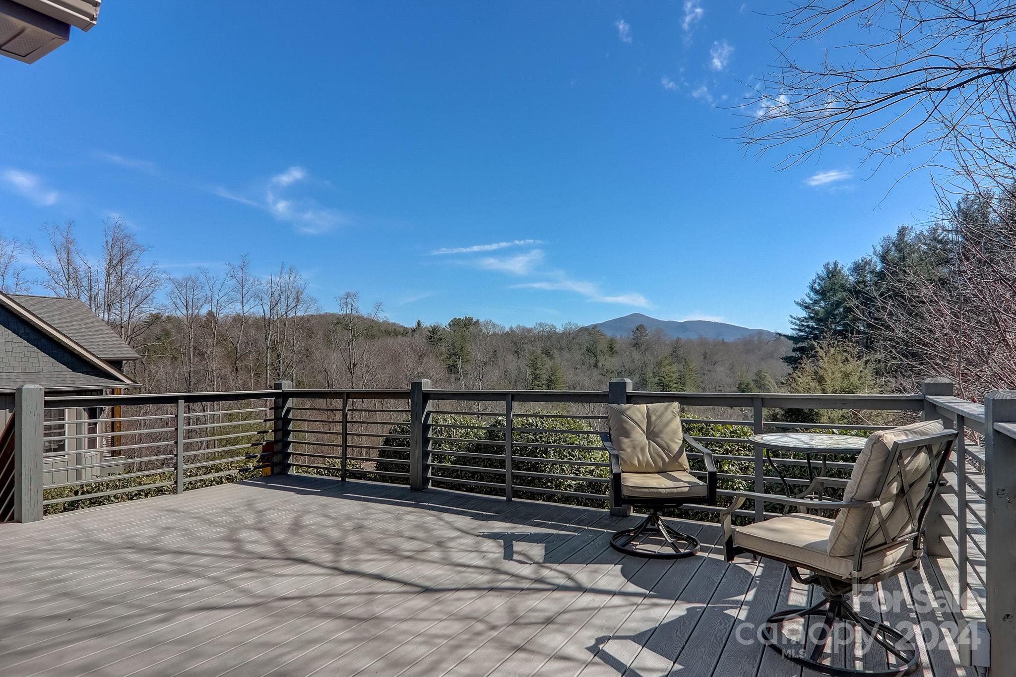34 Ledgestone Drive Fairview, NC 28730 - Photo 40 of 47 a view of a terrace with couches and wooden floor