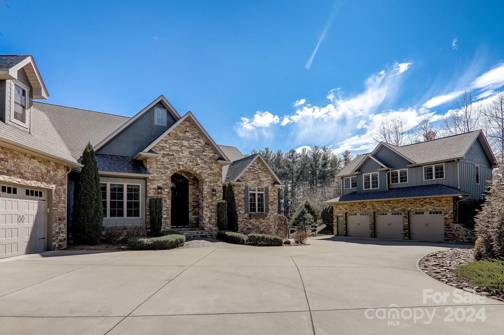 34 Ledgestone Drive Fairview, NC 28730 - Photo 4 of 47 a front view of a house with a yard