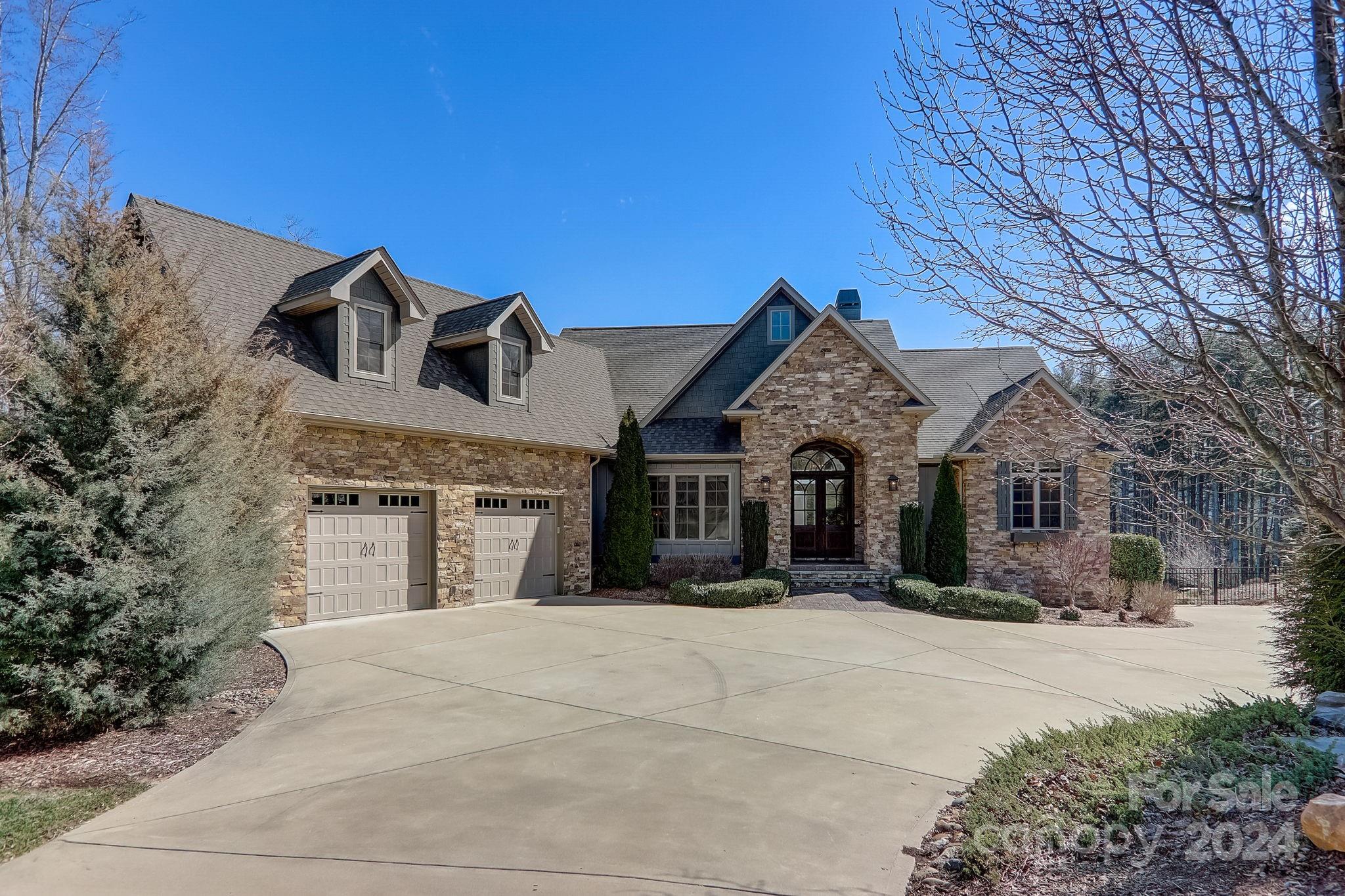 34 Ledgestone Drive Fairview, NC 28730 - Photo 5 of 47 a front view of a house with a yard