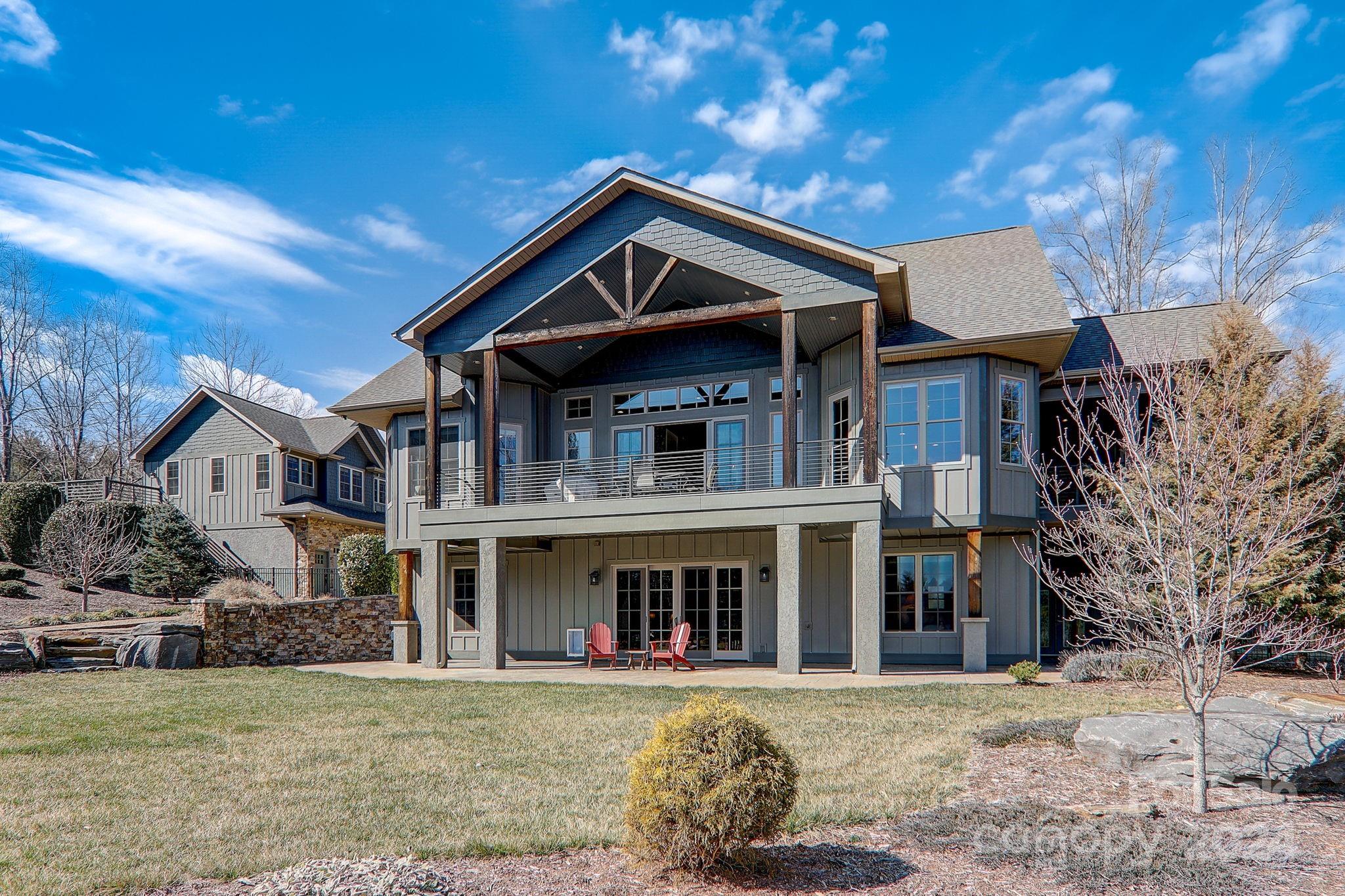 34 Ledgestone Drive Fairview, NC 28730 - Photo 7 of 47 a front view of a house with a yard
