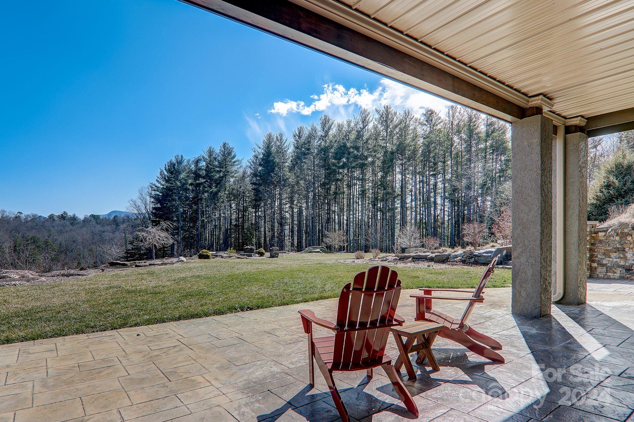 34 Ledgestone Drive Fairview, NC 28730 - Photo 8 of 47 a view of chair and table in the patio