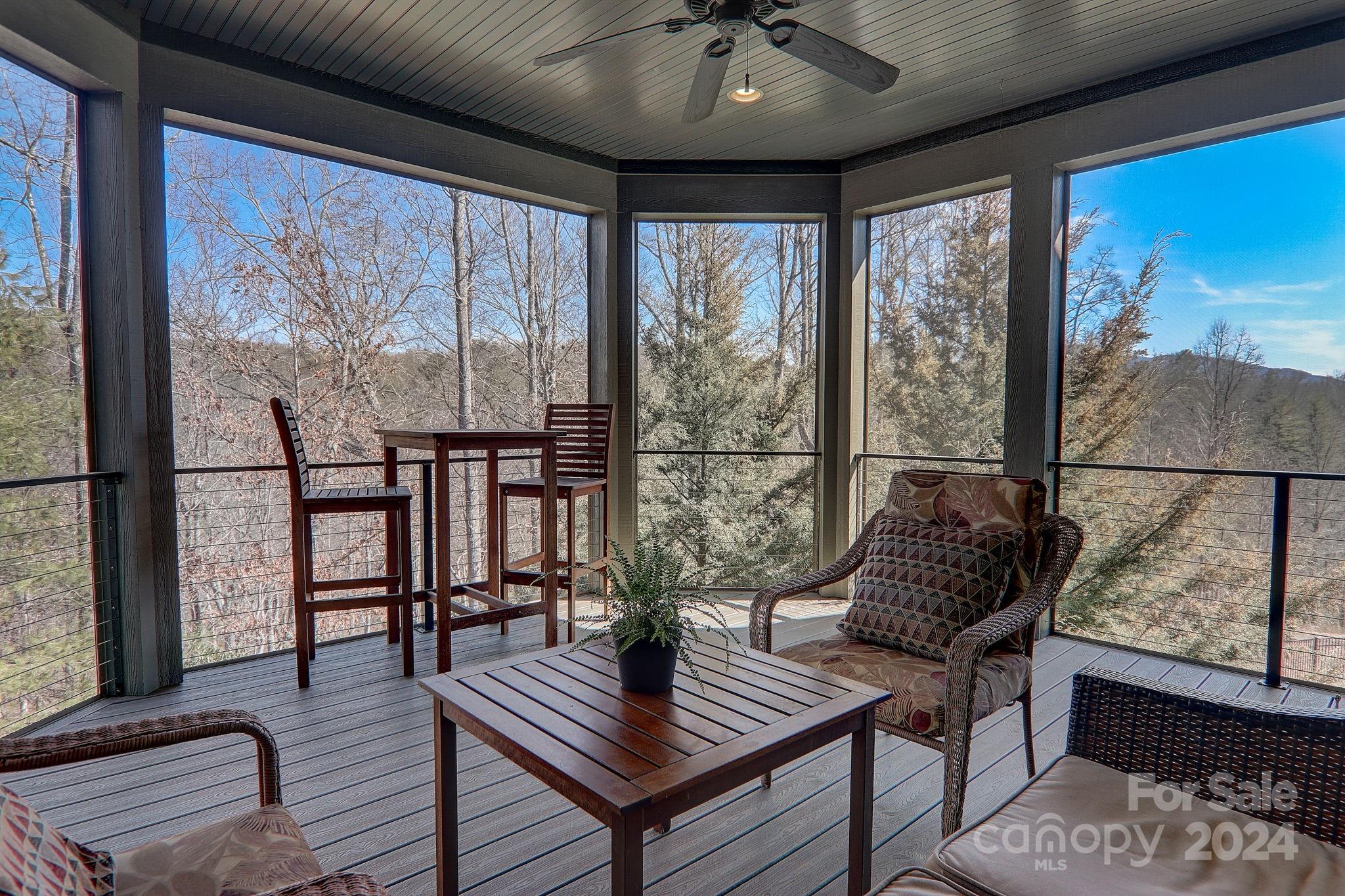 34 Ledgestone Drive Fairview, NC 28730 - Photo 9 of 47 a living room with furniture and a large window