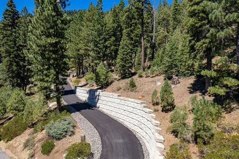 a view of a backyard of the house