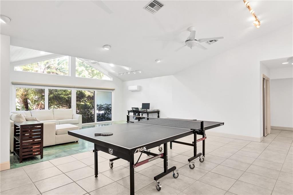 2075 Spring Place Vero Beach, FL 32963 - Photo 17 of 36 a view of a dining room with furniture
