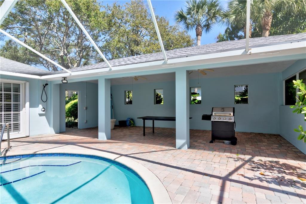 2075 Spring Place Vero Beach, FL 32963 - Photo 32 of 36 a view of a house with sitting area and porch