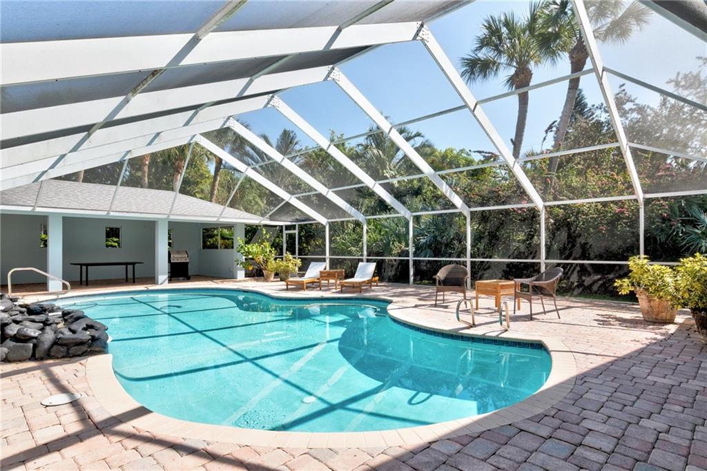 2075 Spring Place Vero Beach, FL 32963 - Photo 33 of 36 a view of swimming pool with outdoor seating