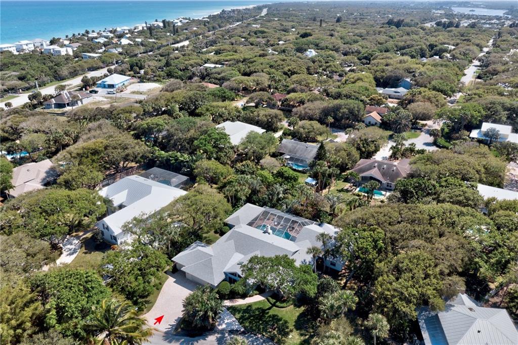 2075 Spring Place Vero Beach, FL 32963 - Photo 4 of 36 an aerial view of residential houses with outdoor space