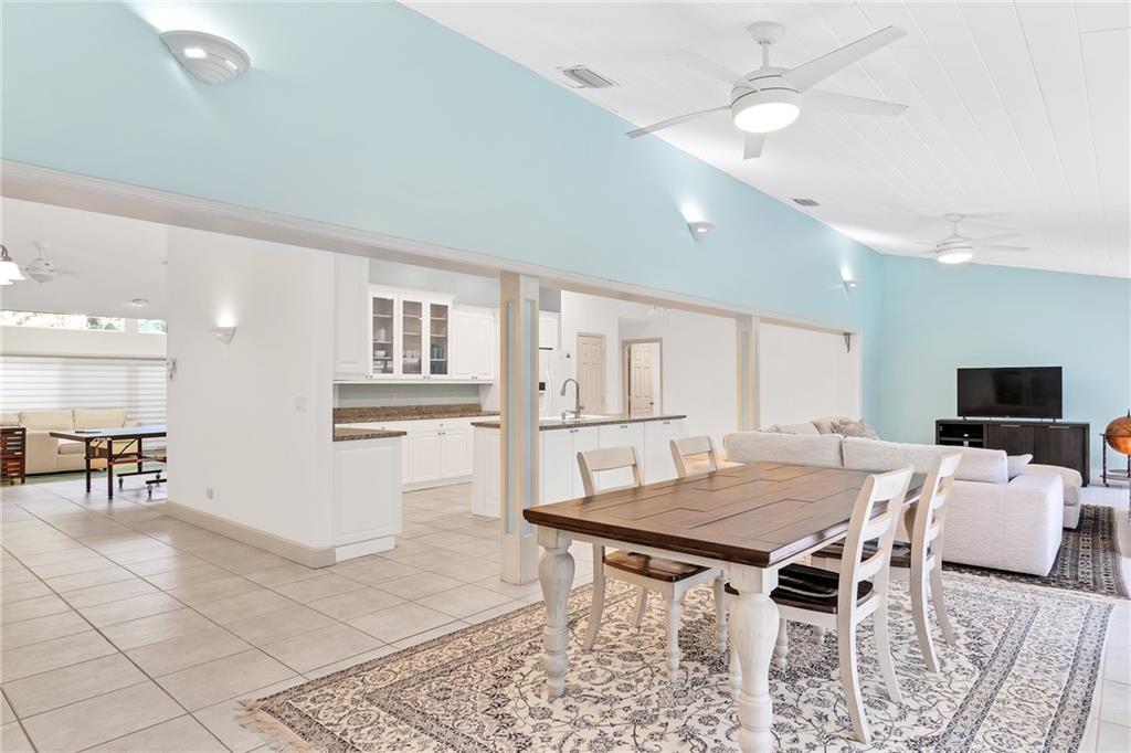 2075 Spring Place Vero Beach, FL 32963 - Photo 9 of 36 a view of a dining room with furniture
