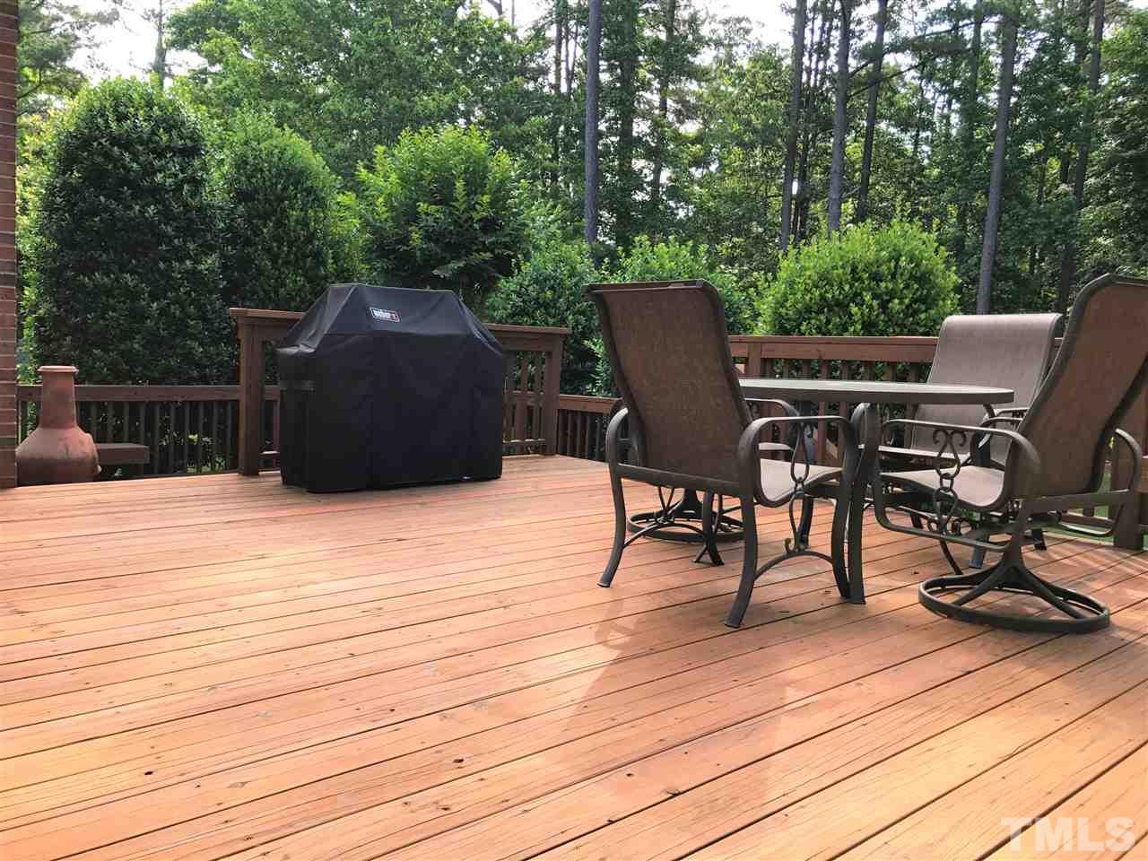 5500 Overleaf Court Raleigh, NC 27615 - Photo 19 of 24 beautiful large 2 level deck, great for entertaining and large enough for a hot tub with master bedroom garden door adjacent to private deck level.