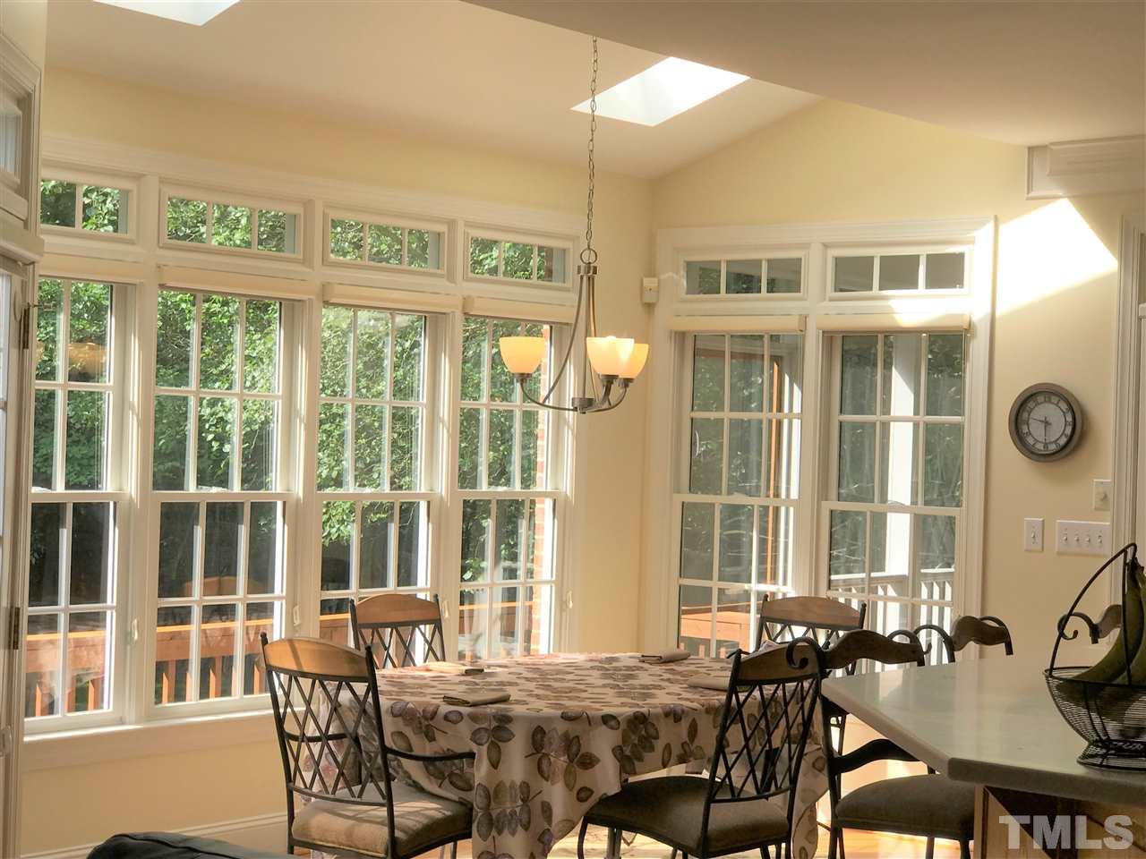 5500 Overleaf Court Raleigh, NC 27615 - Photo 5 of 24 lovely space with lots of windows, natural light and skylights above!