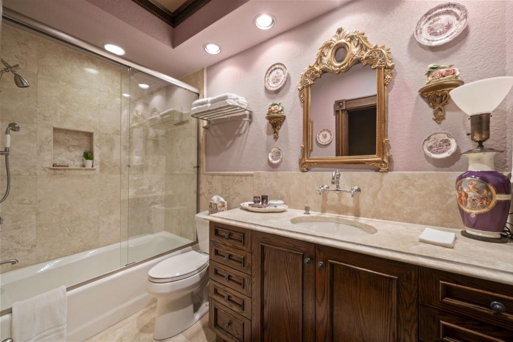 114 Lees Lake Road Fayetteville, GA 30214 - Photo 47 of 67 a bathroom with a granite countertop sink a toilet and bathtub