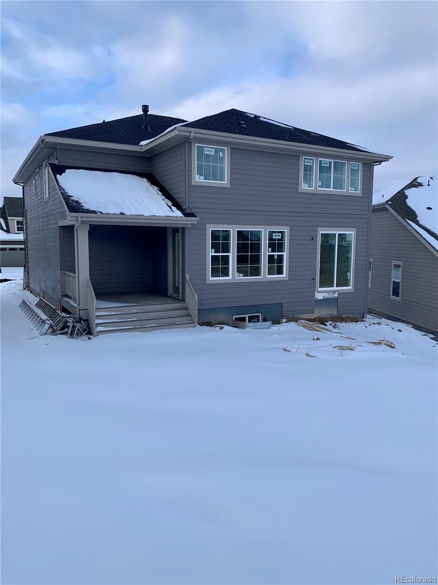 122 Green Fee Circle Castle Pines, CO 80108 - Photo 2 of 4 a front view of house with yard