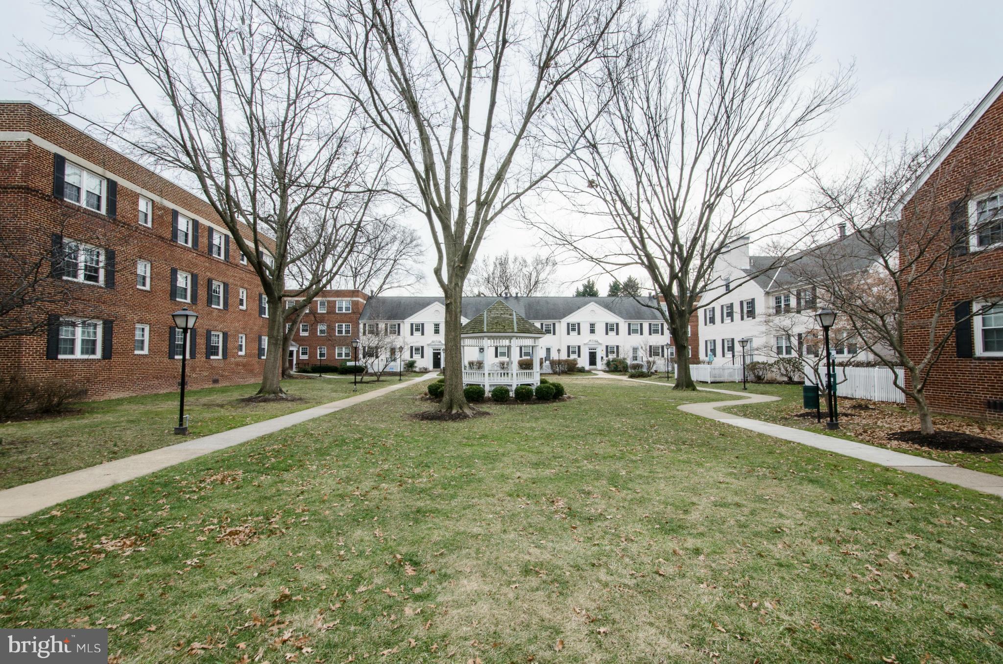 2912 13th Road South, Unit 204 Arlington, VA 22204 - Photo 13 of 13 a view of a yard with a house in the background