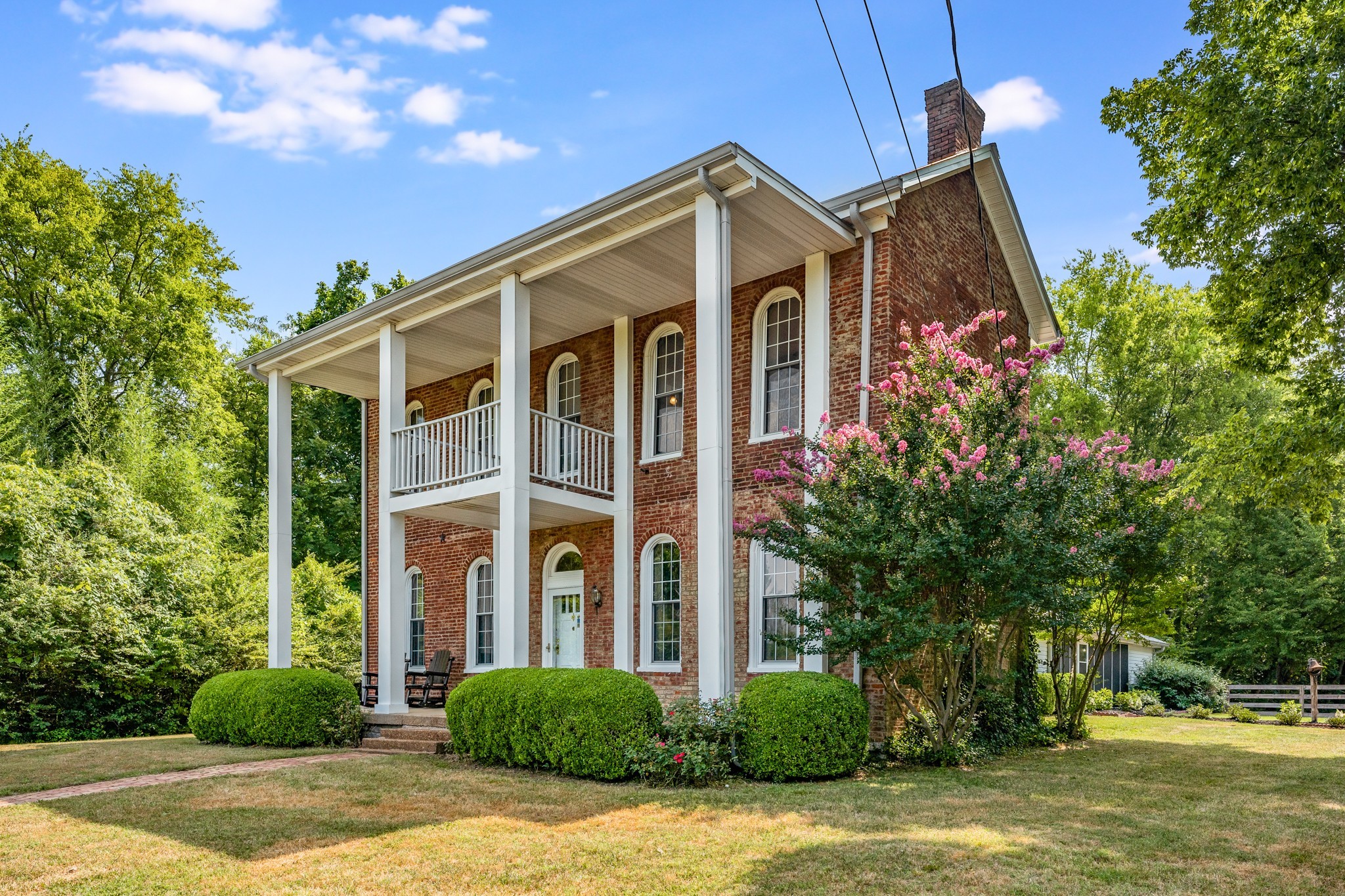 5704 Cane Ridge Road Antioch, TN 37013 - Photo 47 of 50 a front view of a house with garden