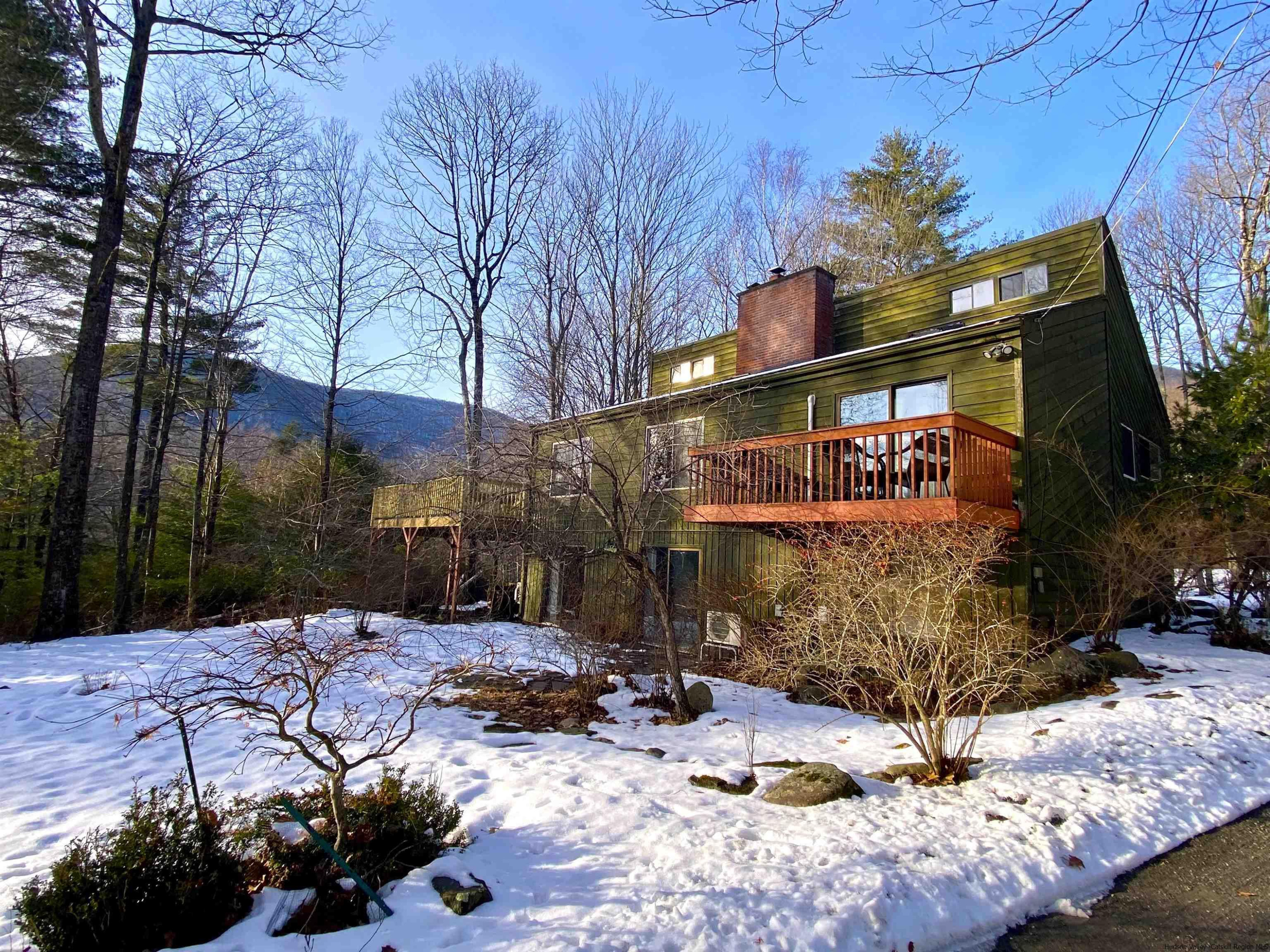 a view of backyard with a patio