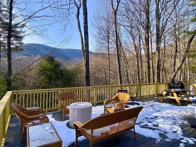 a deck view with a seating space