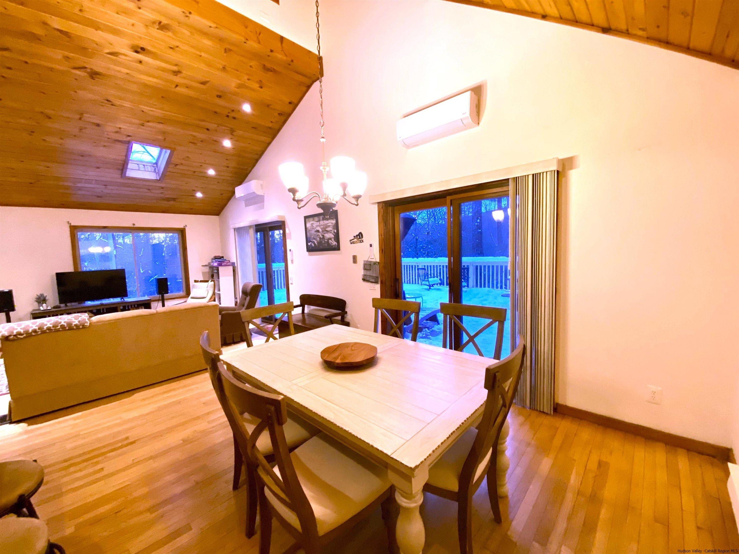 295 Grog Kill Road Willow, NY 12495 - Photo 4 of 14 a view of a dining room with furniture and wooden floor