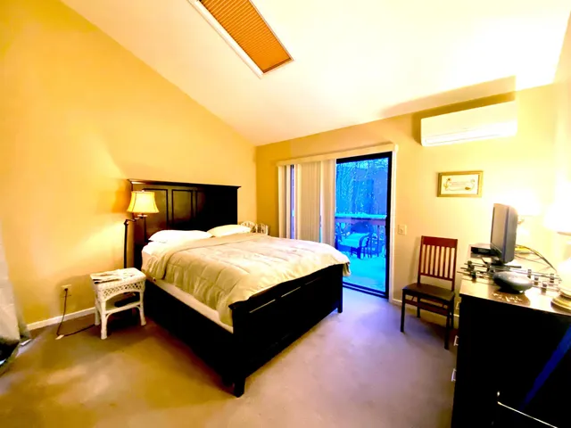 a bed room with a bed and furniture