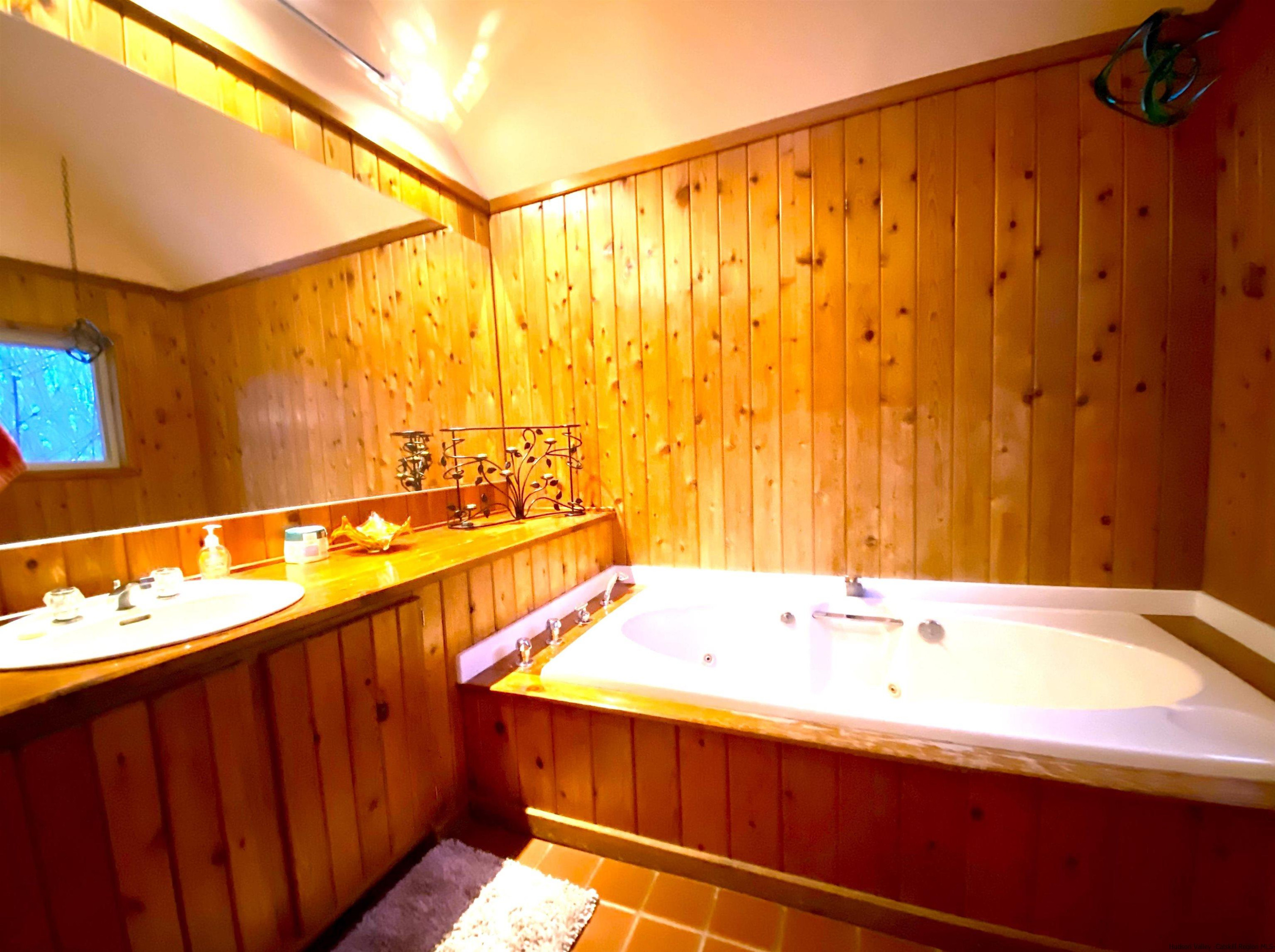 295 Grog Kill Road Willow, NY 12495 - Photo 8 of 14 a bathroom with a sink and a bathtub