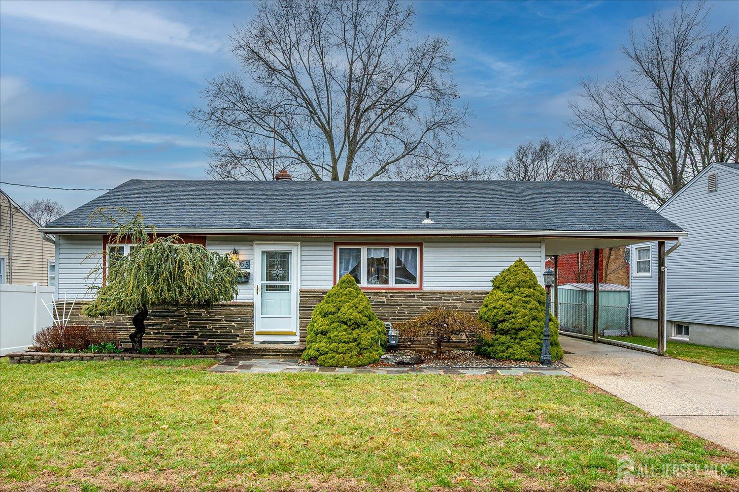 front view of a house with a yard