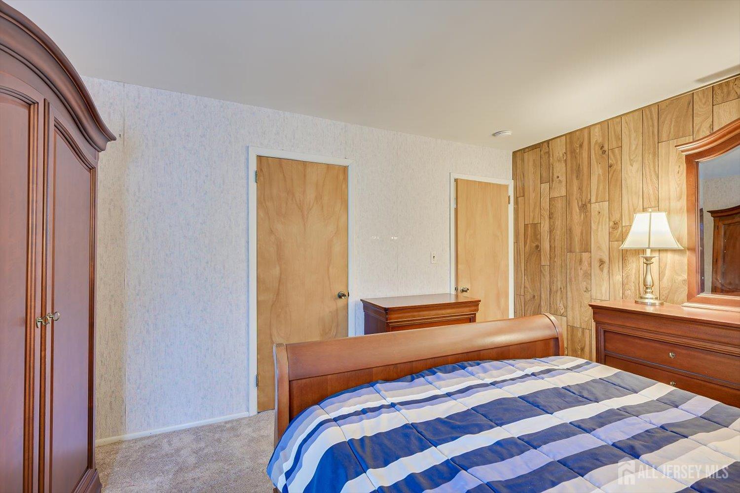 65 Rose Street Edison, NJ 08817 - Photo 18 of 35 a bedroom with a bed and a window