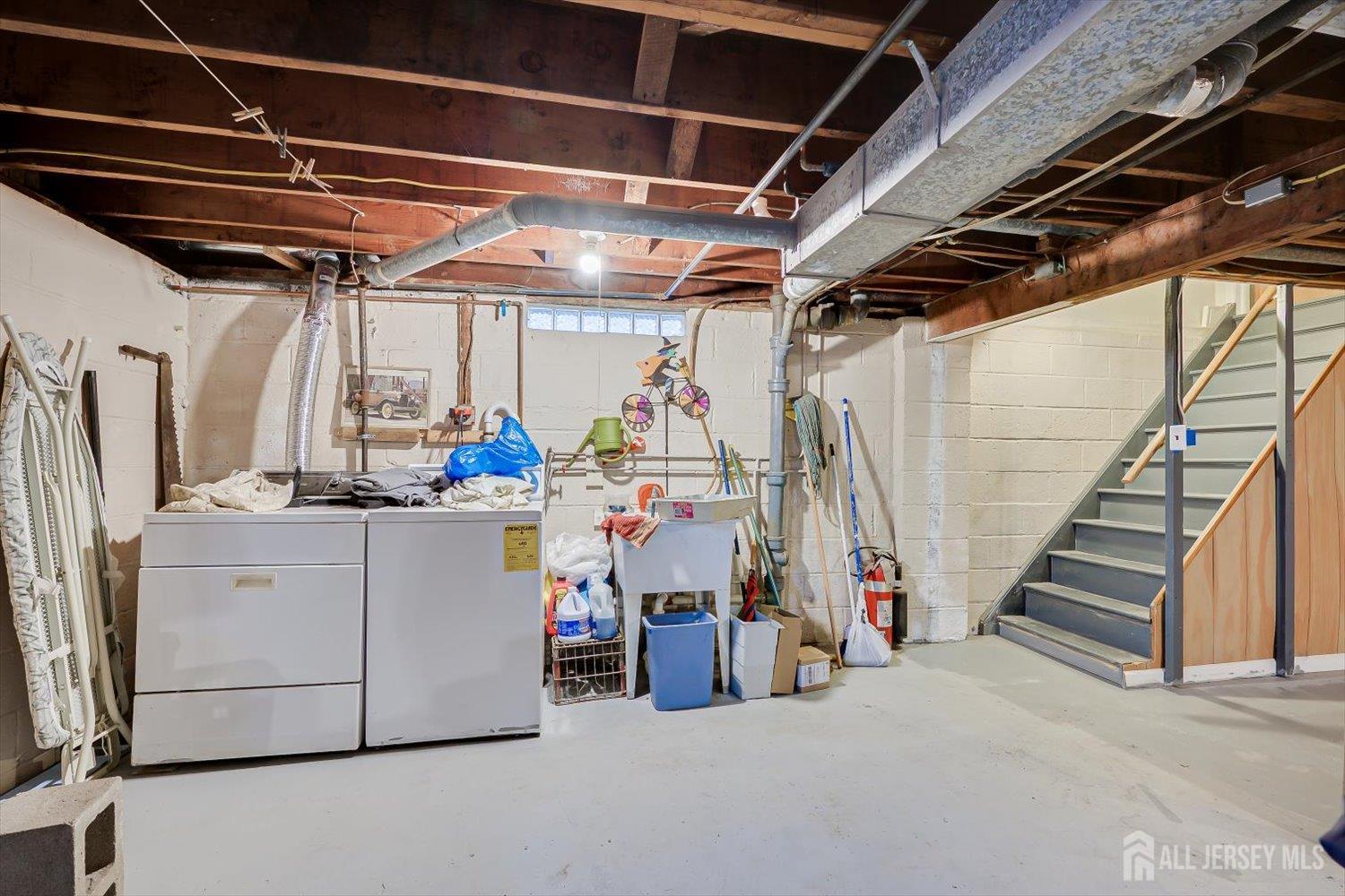 65 Rose Street Edison, NJ 08817 - Photo 27 of 35 a view of storage and utility room with stairs
