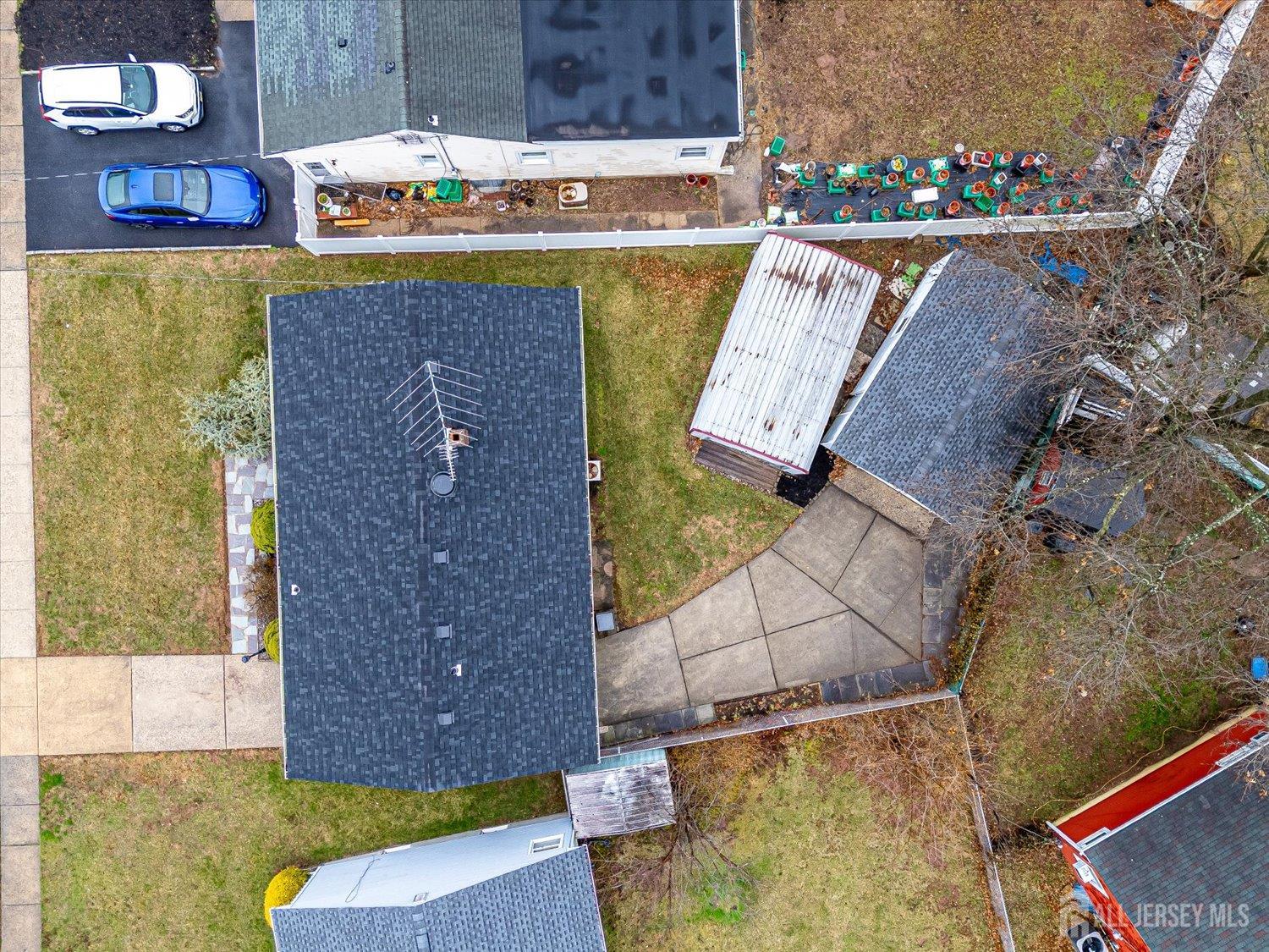 65 Rose Street Edison, NJ 08817 - Photo 31 of 35 an aerial view of a house with a yard
