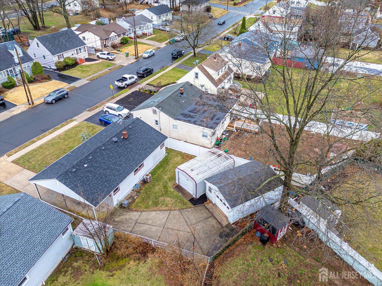 65 Rose Street Edison, NJ 08817 - Photo 32 of 35 an aerial view of a house with a yard