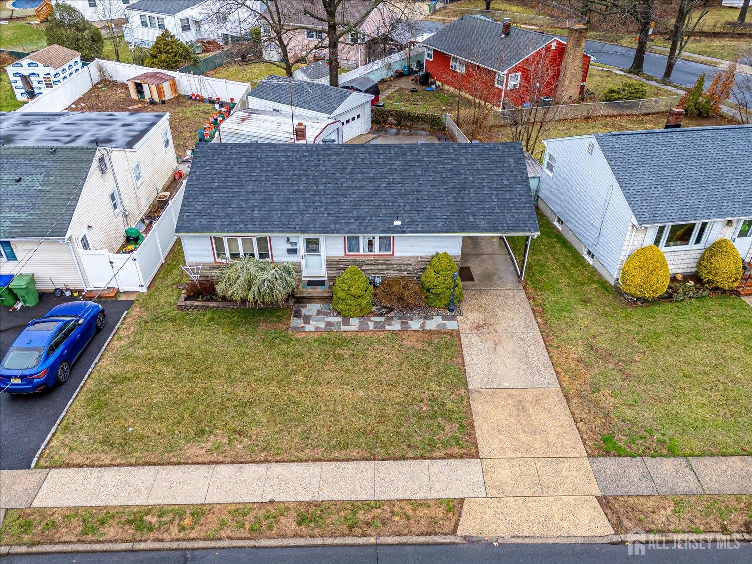 65 Rose Street Edison, NJ 08817 - Photo 4 of 35 a aerial view of a house with a yard