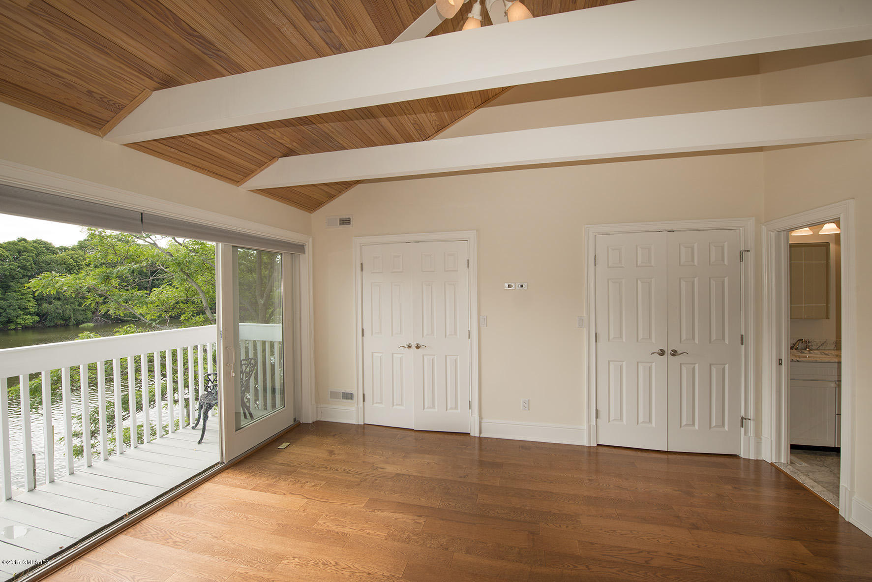 115 River Road, Unit 16 Cos Cob, CT 06807 - Photo 4 of 7 Master Bedroom Suite