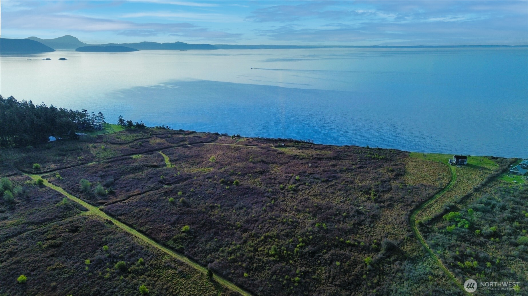 0 Decatur Beach Lane Anacortes, WA 98221 - Photo 11 of 20 a view of an ocean beach and mountain